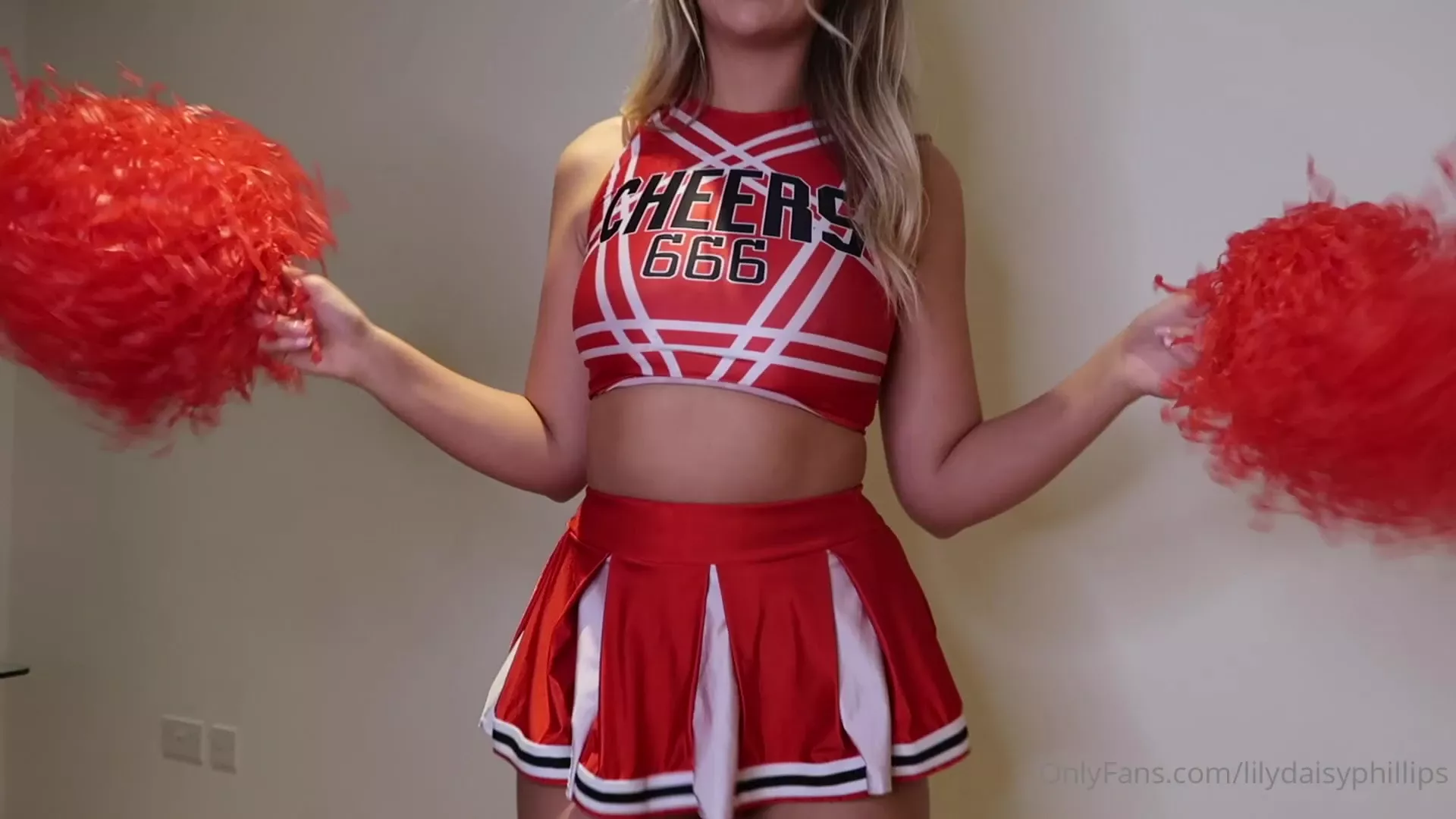 sexy british cheerleader Lillian Phillips teasing her naked pussy