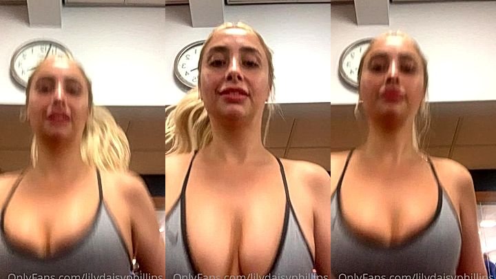 Lillian Phillips teasing her deep cleavage in her sports bra