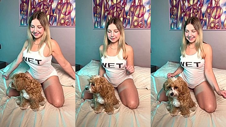 american blonde girl Judy Blooms shaking her tits with her dog in bed