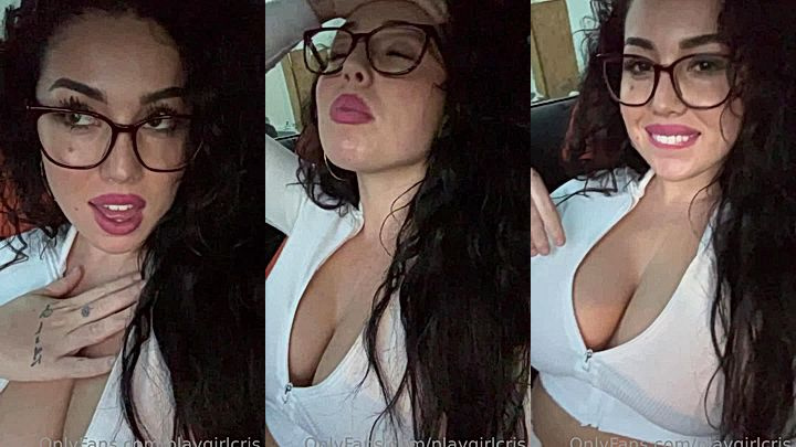 Playgirlcris teasing her deep cleavage in her car