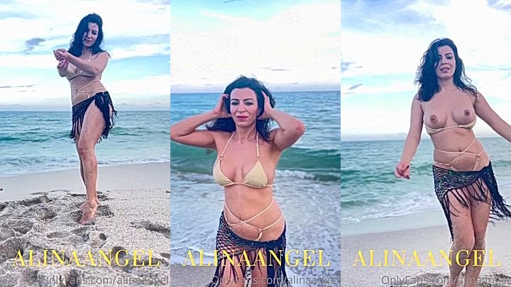 Alina Angel sexy topless dancing on the public beach
