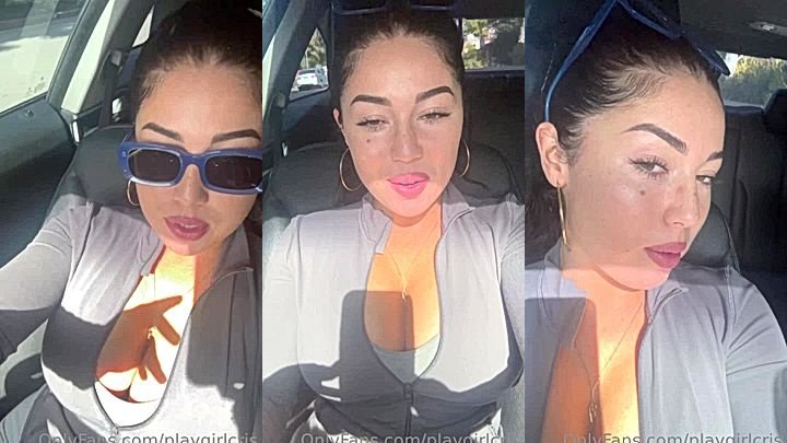 Playgirlcris teasing her deep cleavage in the car