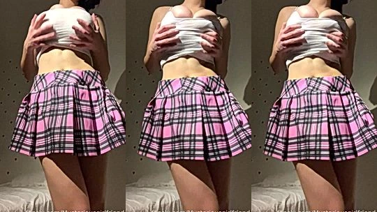 Sierra Lisabeth teasing her big ttis in her pink short skirt