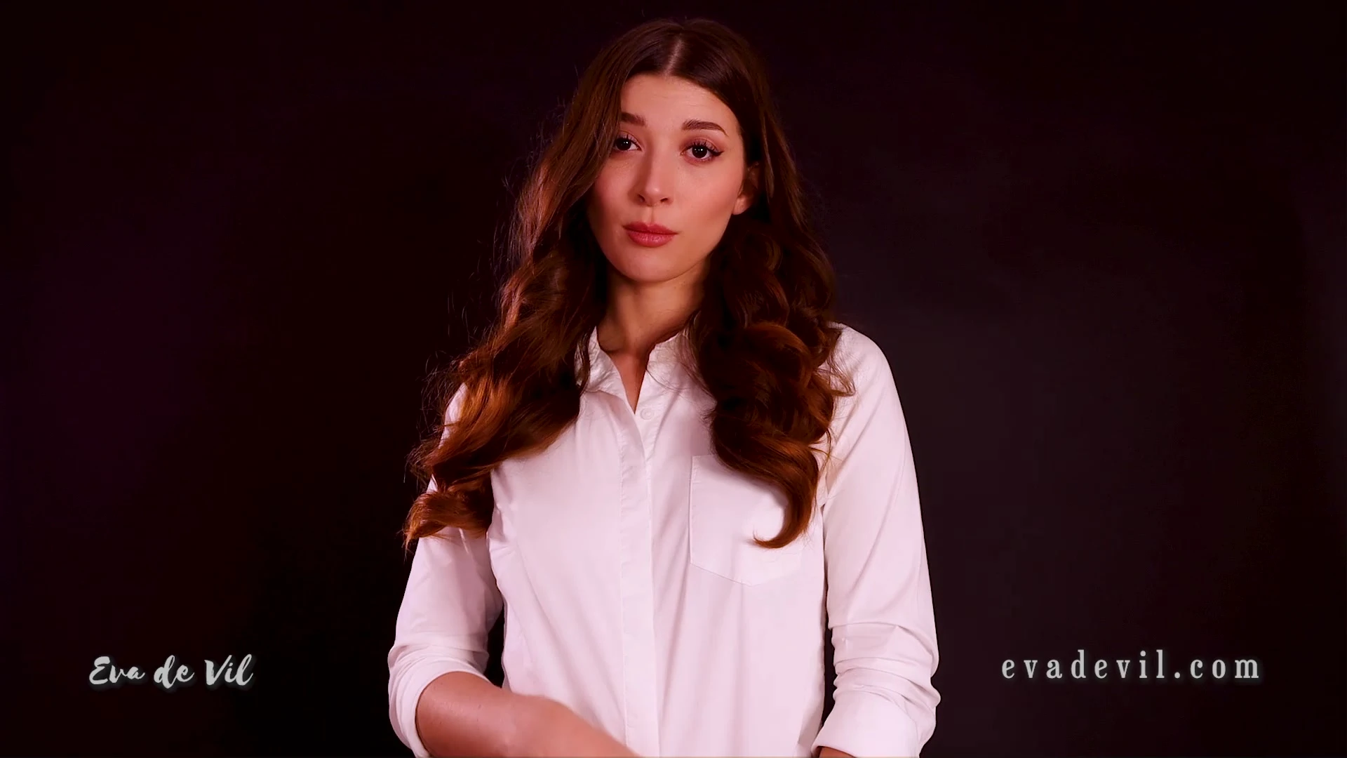 Eva de Vil teasing her sexy slim legs in her white blouse