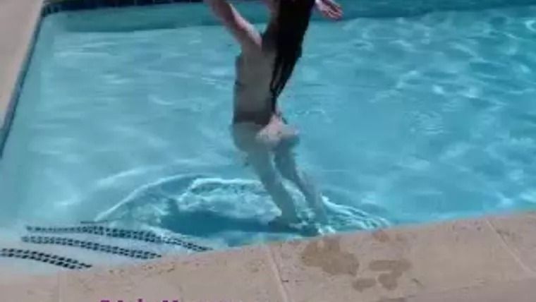Ashe Maree teasing her naked body in the pool