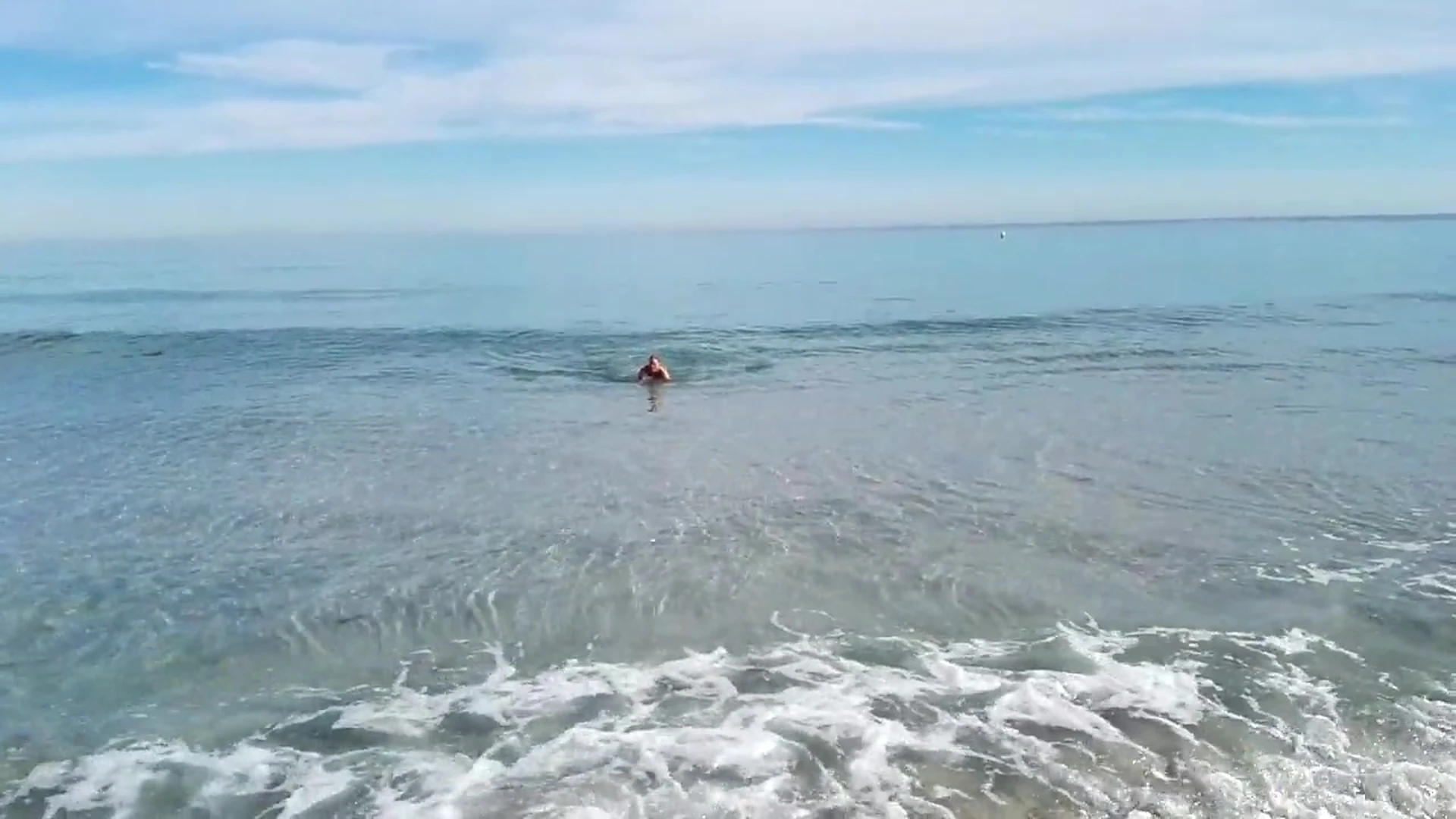 Kathia Nobili teasing her naked body by the ocean