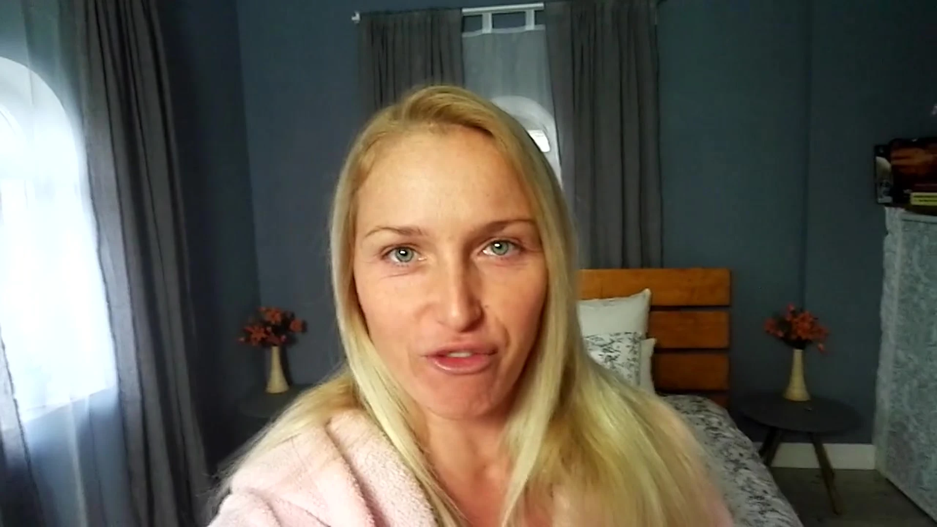 Kathia Nobili flashing her tits in her bathrobe