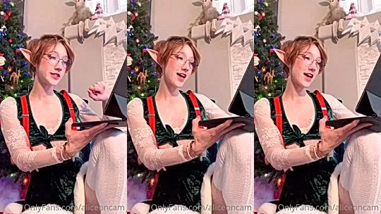 AliceOnCam sexy elf teasing by the christmas tree
