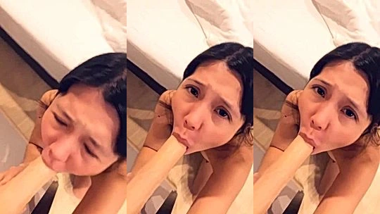 Littlesubgirl sucking on a big dildo on her knees