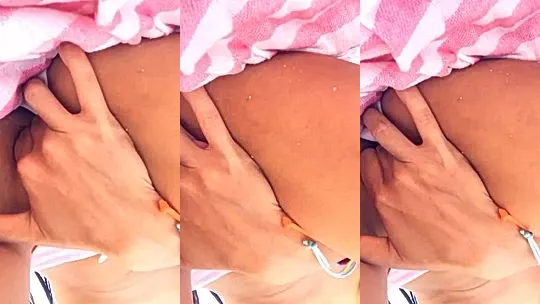Littlesubgirl playing with her naked pussy by the beach